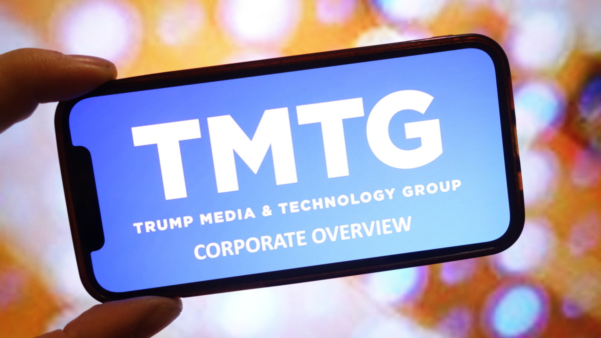 Trump Media and Technology Group company logo displayed on mobile phone