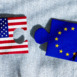 USA vs EU. Tensions Between the United States of America and European Union. Disconnected Puzzle Pieces Symbolize Broken Relations and Geopolitical Disputes.