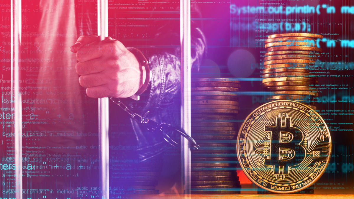 Handcuffed arrested Bitcoin thief in jail, conceptual image