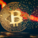 Crypto currency golden coin. Gold bitcoin falling apart. Concept of a cryptocurrency market crisis and defocused chart background.
