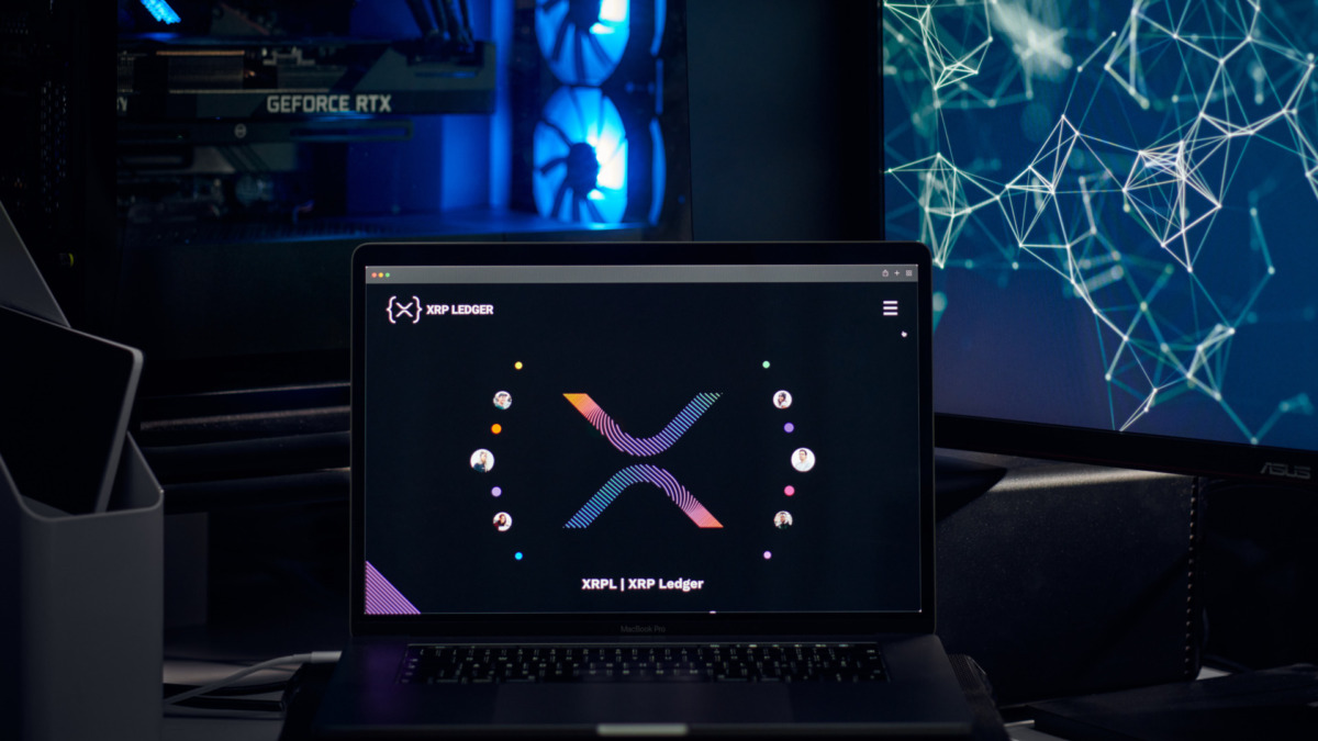 XRP website's hp seen on a laptop screen. xrp, XRP coin logo visible. Cryptocurrency, defi, nft concepts illustrative editorial.