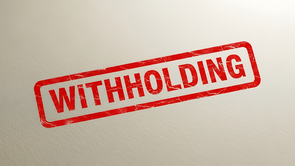 Red stamp clearly shows the word withholding