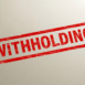 Red stamp clearly shows the word withholding