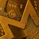 top view extreme macro closeup of crypto Monero golden coin logo symbol