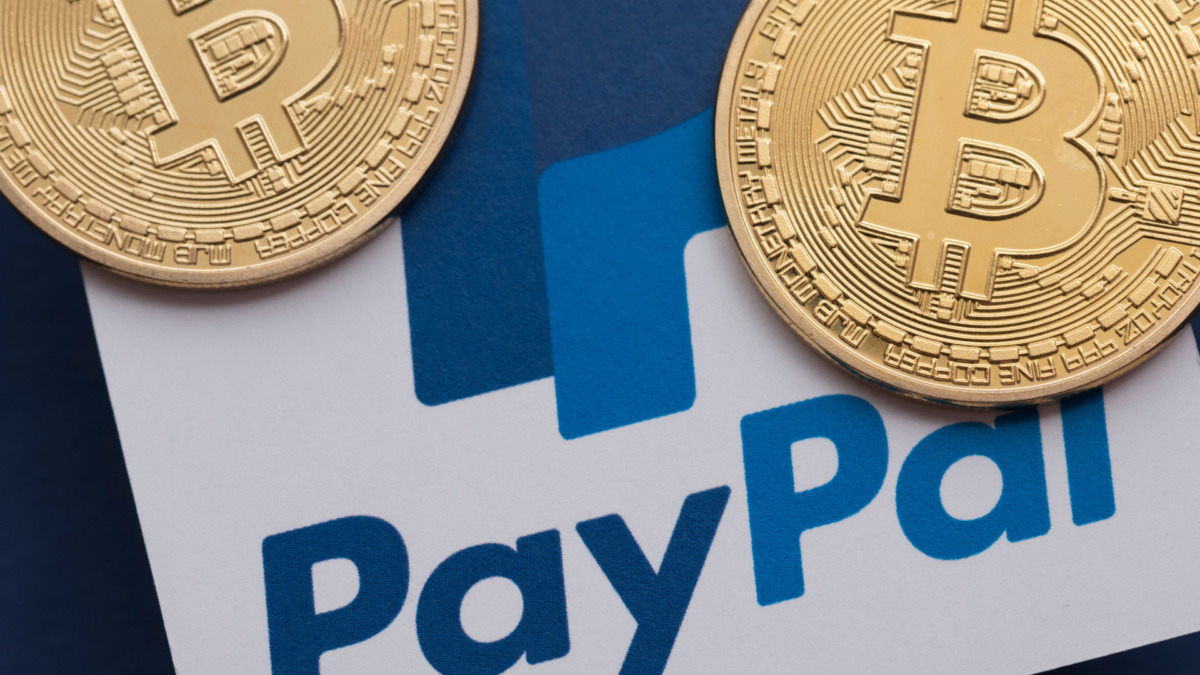 Bitcoin cryptocurrency on a paypal online payment logo.
