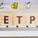 Exchange Traded Products ETP Electronic marketplace on wooden cubes.