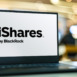 Laptop computer displaying logo of iShares, ETFs managed by BlackRock