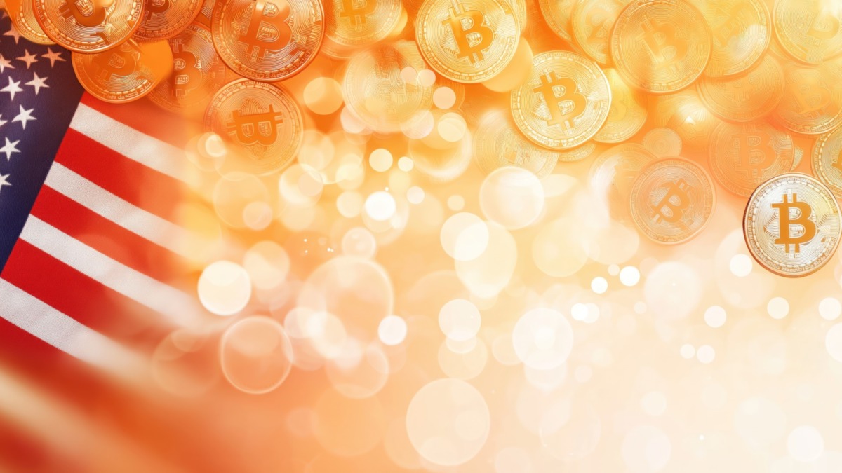 Golden bitcoin coins near United States of America flag. Cryptocurrency investment and financial freedom concept