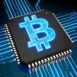 Digital currency concept with a luminous blue Bitcoin logo on a CPU, illustrating blockchain and financial technology.