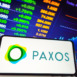 In this photo illustration, the Paxos Trust Company logo is displayed on a smartphone screen