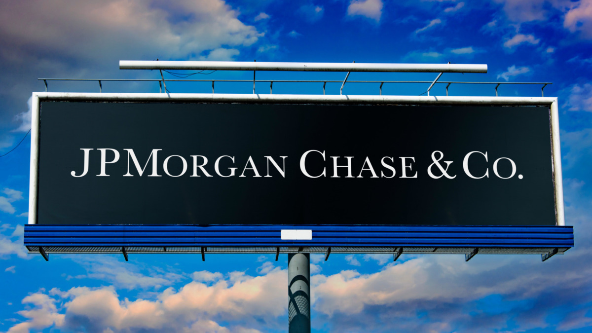 dvertisement billboard displaying logo of JPMorgan Chase & Co., an investment bank and financial services holding company headquartered in New York City, USA