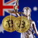 Symbol of law and justice, physical version of Bitcoin and Australia Flag. Prohibition of cryptocurrencies, regulations, restrictions or security, protection, privacy.