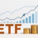 Wooden letters spelling "ETF" alongside increasing stacks of gold coins, set in front of a blurred upward trending financial chart.
