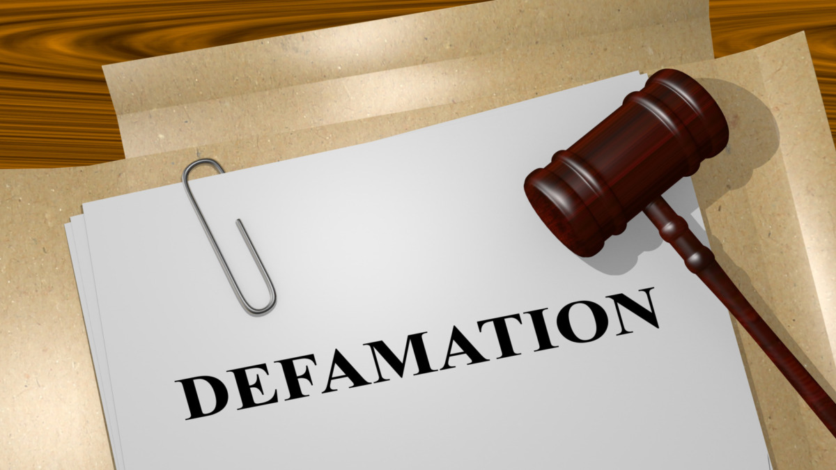 Render illustration of Defamation title on Legal Documents