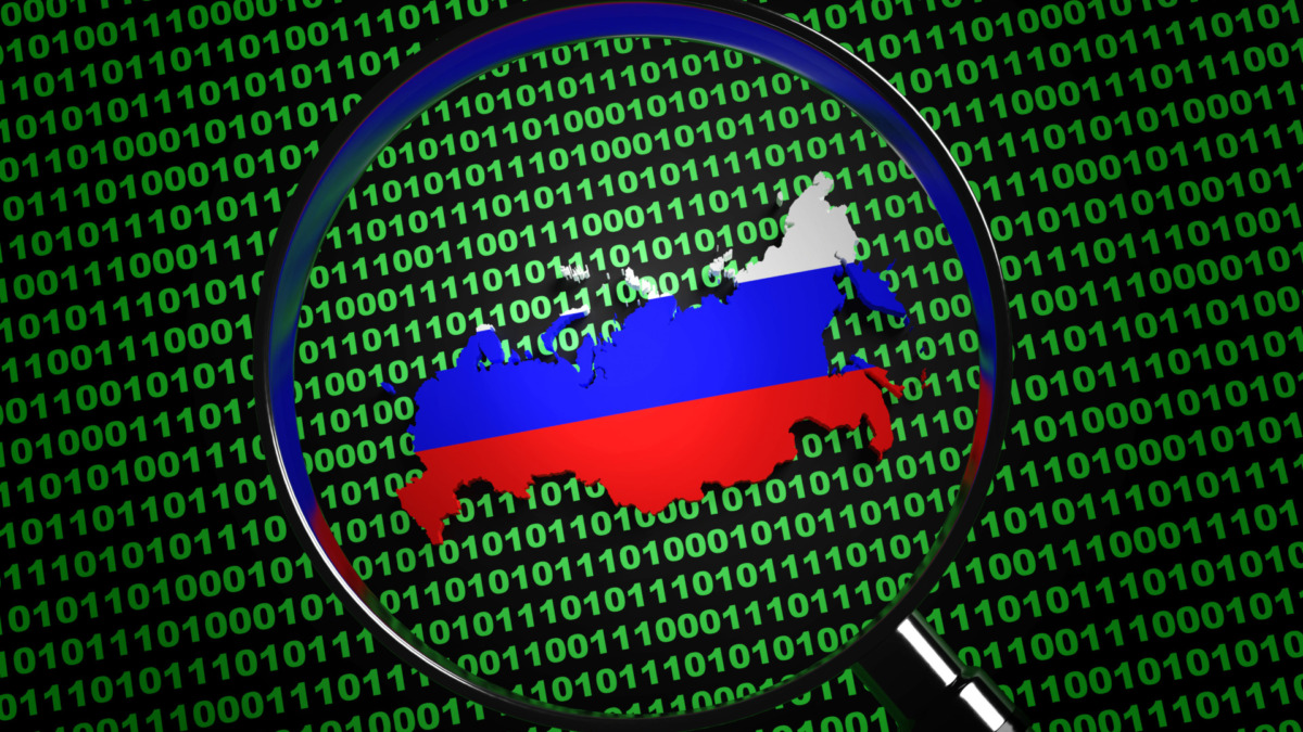 Magnifying glass found the Russia map among computer binary code. Illustration of the concept of Russian Internet hackers