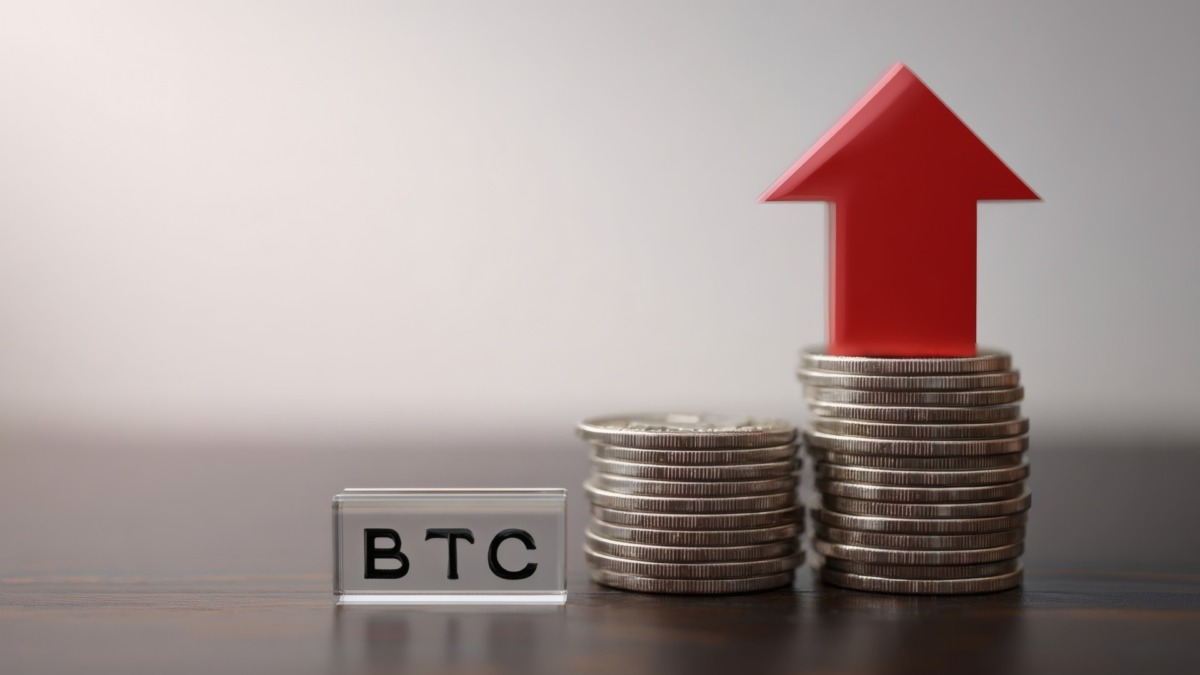 Bitcoin value growth concept with red arrow and coin stacks