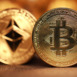 Bitcoin and ethereum coin on a defocused background. Trading on the cryptocurrency exchange.