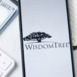 WisdomTree Logo on Phone Screen, Company Icon.