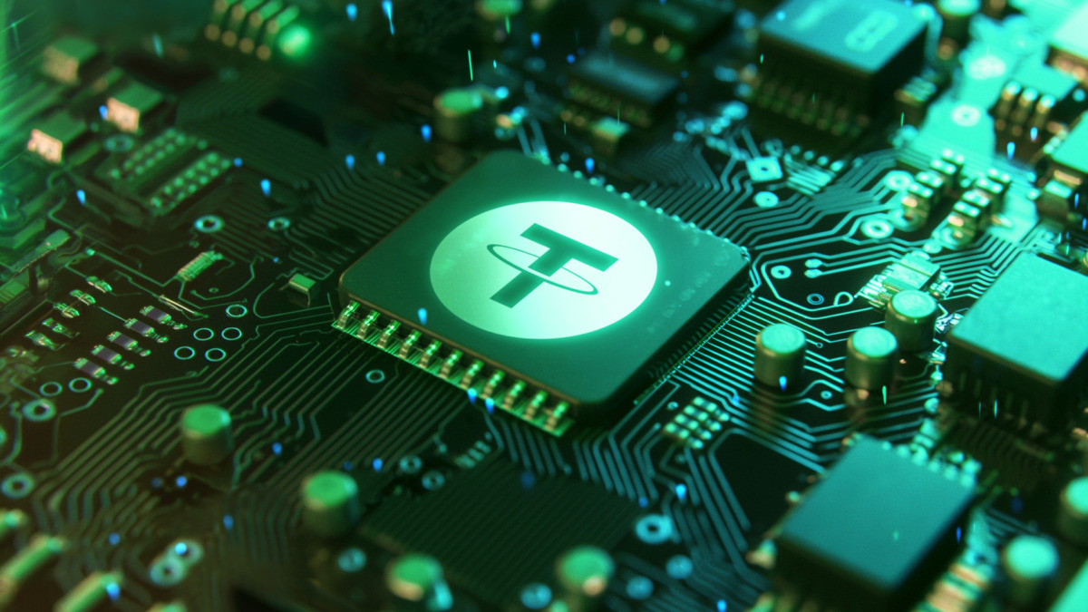 Tether or USDT crypto currency concept. TETHER coin or logo on microchip