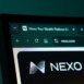 Close-up of a computer screen displaying the nexo web interface in dark mode