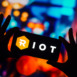 In this photo illustration, the Riot Blockchain Inc. logo is displayed on a smartphone screen