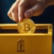 charity, cryptocurrency and fundraising concept - close up of hand putting bitcoin into donation box