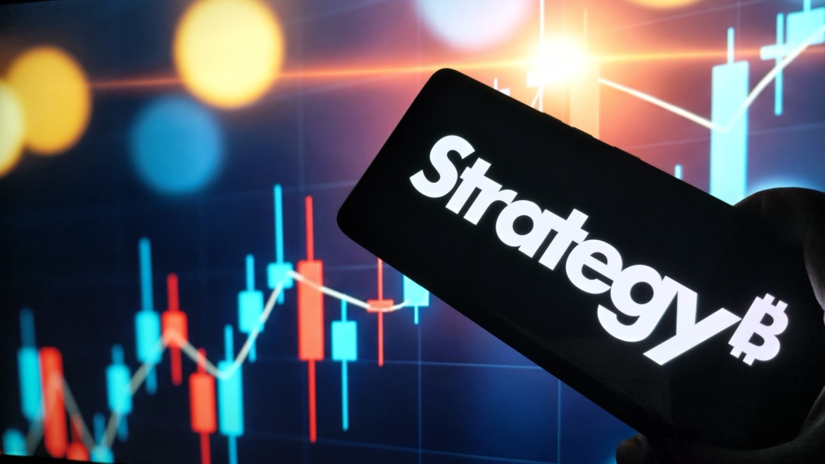 Cryptocurrency trading strategy on mobile device with stock market graph