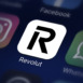 Revolut company logo on the smartphone screen