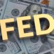 FED word on us dollar banknotes. Reform of the financial system. The federal reserve bank. Control interest rate. Curb inflation. Innovative investment strategy. The concept of economics. 3d render
