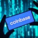 Hands holding smartphone with Coinbase app on screen
