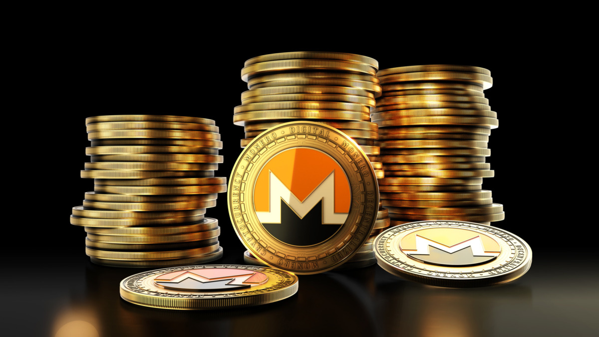 Monero with group of coins on the black background. Decentralized digital cryptocurrency symbol. 3D illustration.