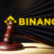 Binance and court session. Judicial hammer on the background of the logo.