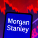 March 15, 2023, Brazil. In this photo illustration the Morgan Stanley logo seen displayed on a smartphone screen, with graphic representation of the stock market in the background