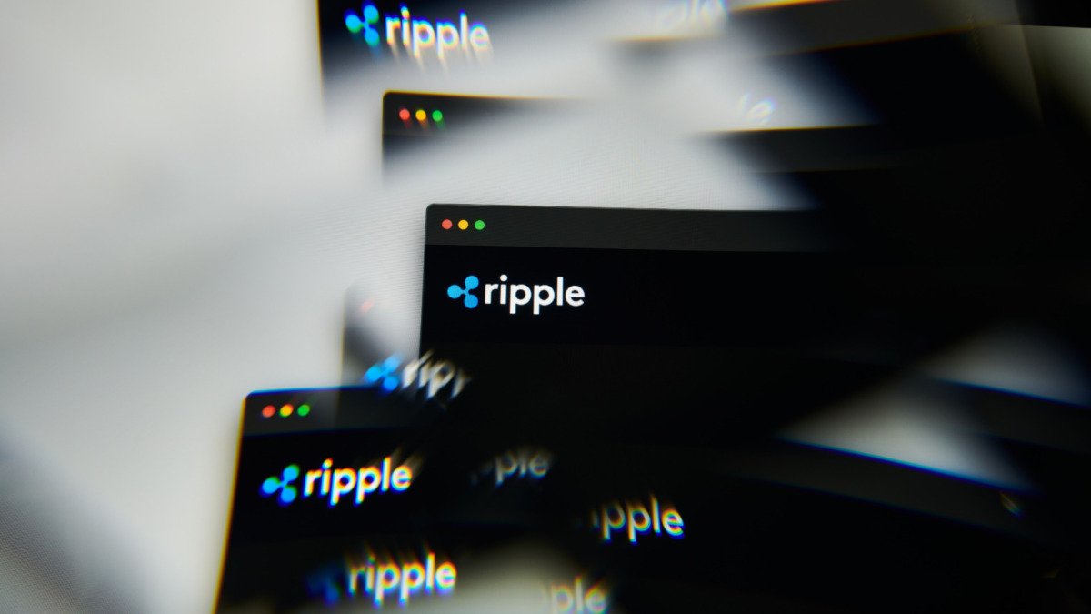 Milan, Italy - January 11, 2022: Ripple logo on laptop screen seen through an optical prism. Dynamic and unique image form Ripple coin website. Illustrative editorial.
